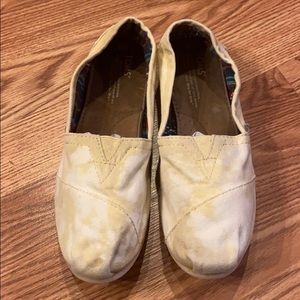 Toms yellow and white slip on shoes